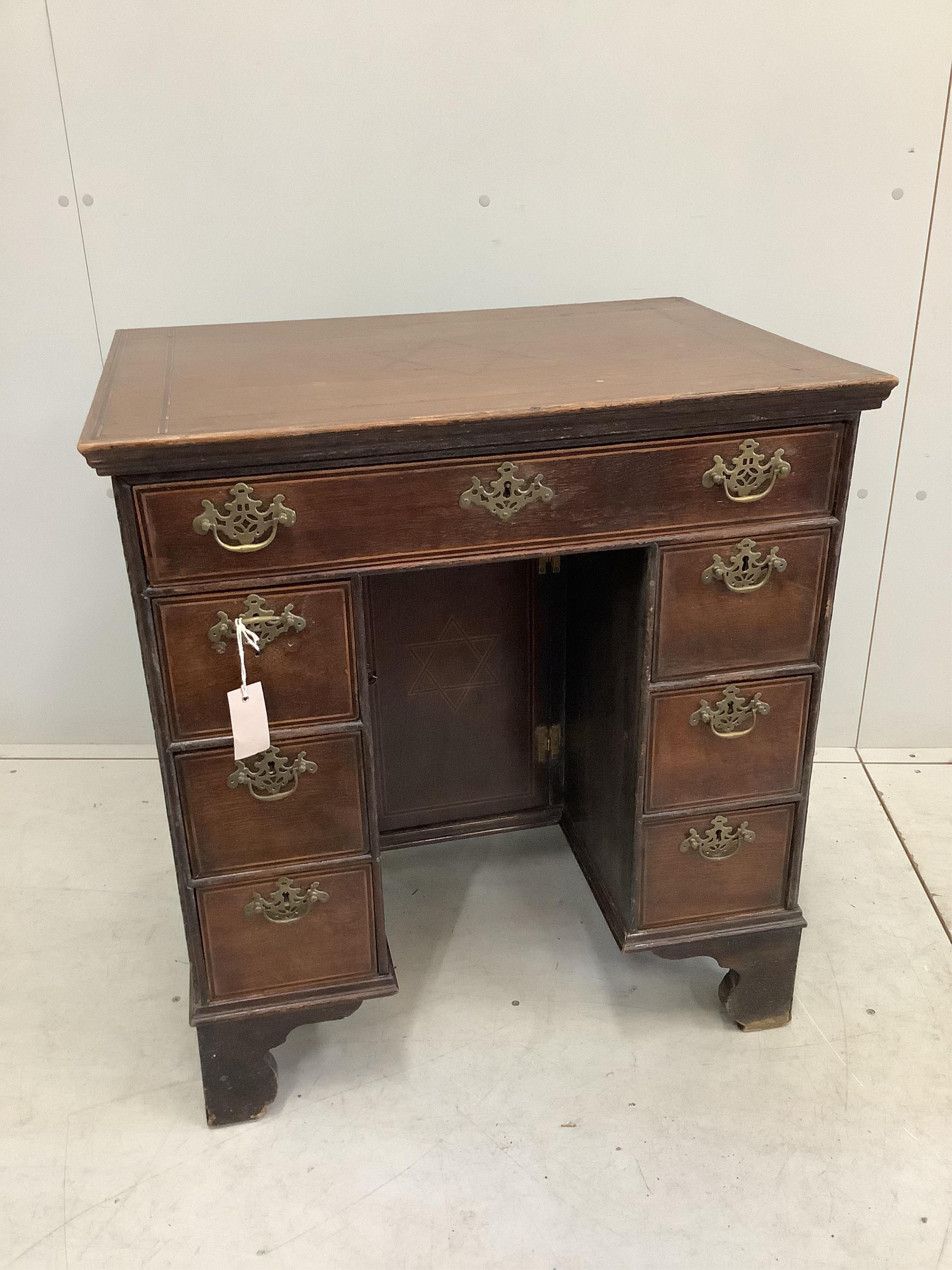 A 19th century banded oak kneehole desk, width 73cm, depth 53cm, height 80cm. Condition - fair